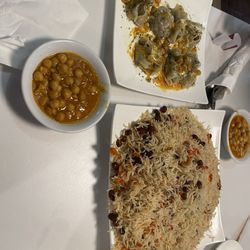 Timorian Restaurant - The dumplings! Lamb covered by rice.