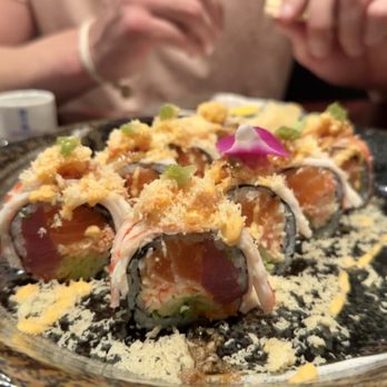 Sushi Ushi - Custom roll with tuna, salmon, crab, and avocado inside + crabmeat and tempura flakes on top with fresh wasabi. - Sushi Bars Near Me - Valrico, Florida