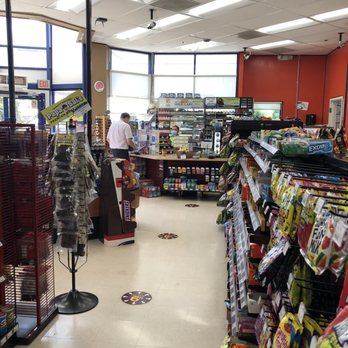 Red Top Rd Power Market - a man standing in the aisle of a store - Gas Stations Near Me - Fairfield, California