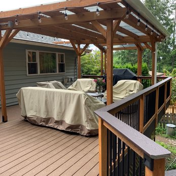 Decks & Spas - Here's a photo of the pergola and fire pit area with the bbq in the background. - Pool & Hot Tub Service Near Me - Redmond, Washington