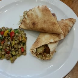 Starring falafel and hummus toasted wrap with guest helping of lentils