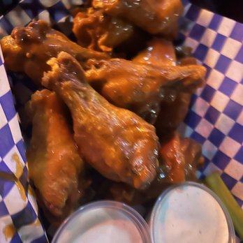 The Maverick - a basket of chicken wings and beer - Sports Bars Near Me - Carrollton, Texas