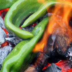 Hatch Village of - Fire-roasting Hatch Chilies is the proper way to do it. :)