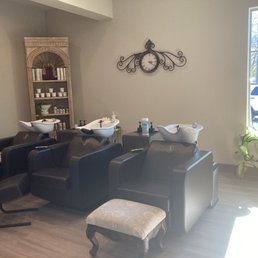 Stylists can stand behind the sink to rinse hair instead of leaning over the customers.
