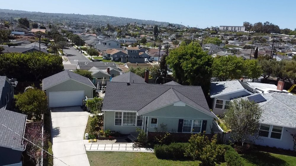 Slide of LCG Roofing