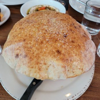 Marina - Blistered bread & ricotta: house-made ricotta cheese, cherry tomatoes, olive oil. - Italian Near Me - Pasadena, California Marina - Blistered bread & ricotta: house-made ricotta cheese, cherry tomatoes, olive oil. - Italian Near Me - Pasadena, California