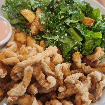 Pimiento Latin American Restaurant - Chicharron de Pollo with a Caesar salad. - Latin American Near Me - Middletown, New York Pimiento Latin American Restaurant - Chicharron de Pollo with a Caesar salad. - Latin American Near Me - Middletown, New York