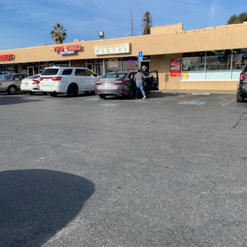 Rica Panaderia 2 - a parking lot with cars parked in front - Bakeries Near Me - San Jose, California Rica Panaderia 2 - a parking lot with cars parked in front - Bakeries Near Me - San Jose, California