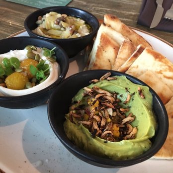 SOCO Kitchen + Bar - Pita with humus, avo and I think yogurt spread - Bars Near Me - Toronto, Ontario SOCO Kitchen + Bar - Pita with humus, avo and I think yogurt spread - Bars Near Me - Toronto, Ontario