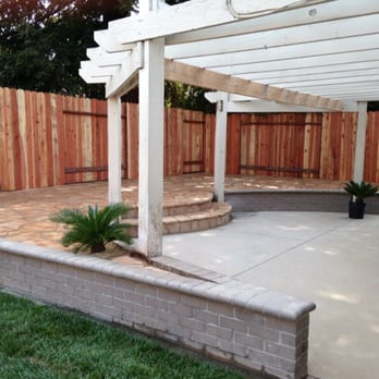 SLS Landscaping - We had shrubs, trees, plants, and weeds growing on our second level. SLS removed it all and installed a flat stone patio. - Landscaping Near Me SLS Landscaping - We had shrubs, trees, plants, and weeds growing on our second level. SLS removed it all and installed a flat stone patio. - Landscaping Near Me