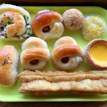 Shan Shan Bakery - a green plate with a variety of food items - Bakeries Near Me - Edmonton, Alberta