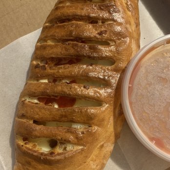 Manhattan Pizza & Pasta - Stromboli with pepperoni and sausage - Pizza Near Me - Gaithersburg, Maryland Manhattan Pizza & Pasta - Stromboli with pepperoni and sausage - Pizza Near Me - Gaithersburg, Maryland