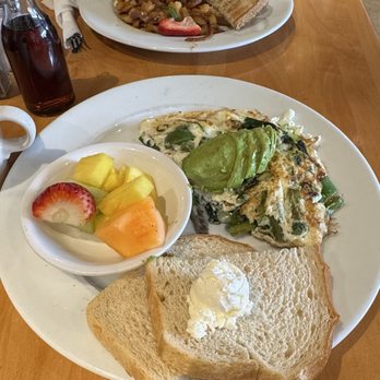 Honey's Bistro - Egg white green omelette with sourdough toast and fruit with matcha latte. Seafood omlette with rye toast and potatoes. - Breakfast & Brunch Near Me - Encinitas, California