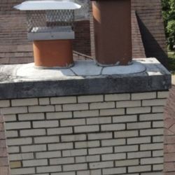 Nombach Roofing & Tuckpointing - Cracked area was Caulked instead of removed and replaced new. Saw  this thanks to my drone