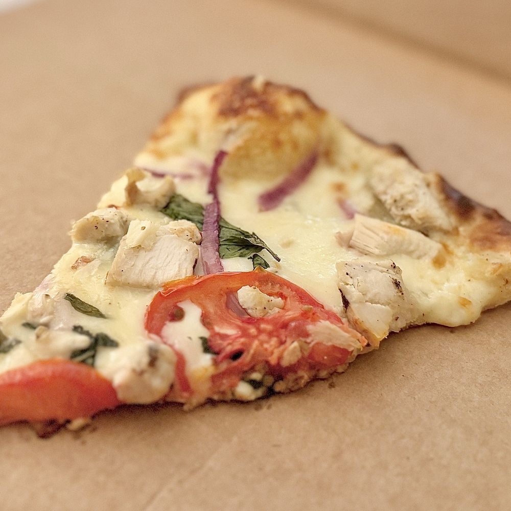 The GREAT WHITE PIZZA. Customized: remove feta, add tomato, onion, basil, chicken and fresh mozzarella The GREAT WHITE PIZZA. Customized: remove feta, add tomato, onion, basil, chicken and fresh mozzarella