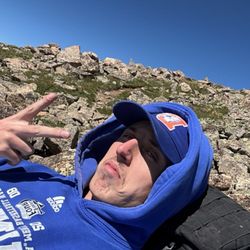 Mount Elbert - Me being very comfortable on a grassy patch.
