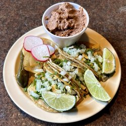 Taqueria La Nueva - Three Pollo (Chicken) Tacos with a Side of Beans and Toppings from the Toppings Bar