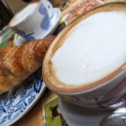 La Cité - Capuccino and pastry