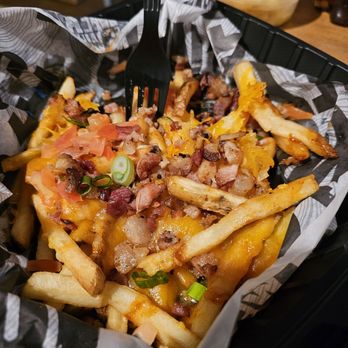 Smokey Bones Warwick - The Naco Fries, are very tasty. For me was a little bit salty. - Barbeque Near Me - Warwick, Rhode Island Smokey Bones Warwick - The Naco Fries, are very tasty. For me was a little bit salty. - Barbeque Near Me - Warwick, Rhode Island