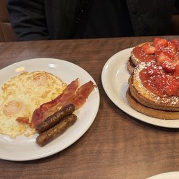 Berry Stuffed French Toast Slam® w/ over easy eggs, bacon, and sausage Berry Stuffed French Toast Slam® w/ over easy eggs, bacon, and sausage