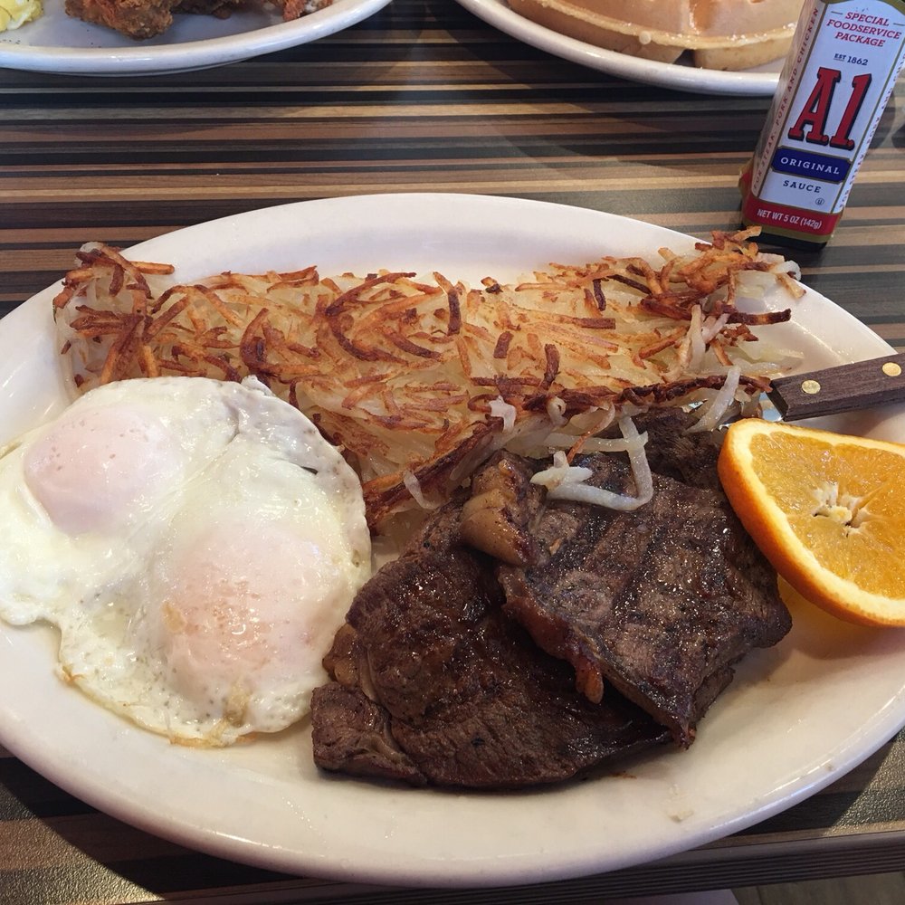 Tom's - Pasadena - Rib eye steak & eggs with hash browns and a side of orange - Burgers Near Me - Pasadena, California Tom's - Pasadena - Rib eye steak & eggs with hash browns and a side of orange - Burgers Near Me - Pasadena, California