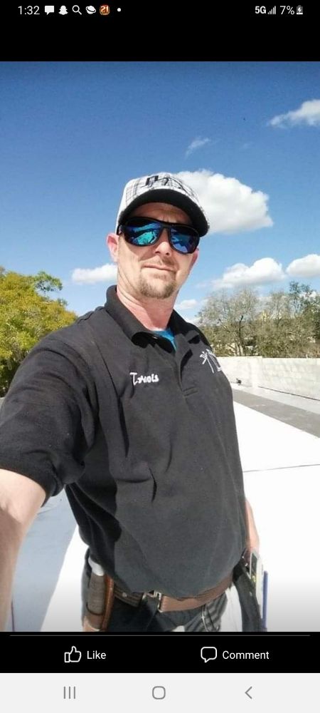 Slide of Travie T's Roofing Firm