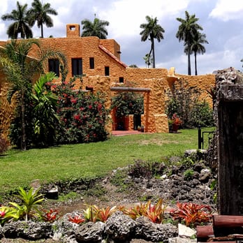 The Curtiss Mansion - The back of the mansion and its gardens, including a stone bridge. - Venues & Event Spaces Near Me - Miami Springs, Florida The Curtiss Mansion - The back of the mansion and its gardens, including a stone bridge. - Venues & Event Spaces Near Me - Miami Springs, Florida