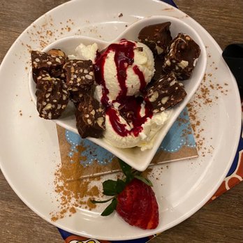 La Paella - Vanilla ice cream, Cherry compote, chocolate and Nutella bites. - Spanish Near Me - Toronto, Ontario