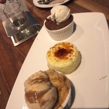 Yard House - $10.95 dessert Mini Trio Sampler (Featured) good choice my fave was crepe brûlée cheese cake - New American Near Me - Concord, California