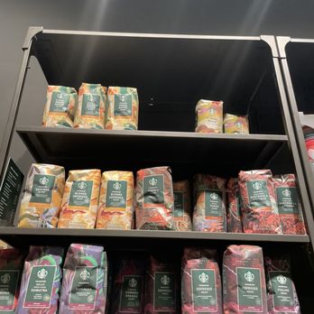 Starbucks - a shelf of coffee bags in a store - Coffee & Tea Near Me - Plymouth, Massachusetts Starbucks - a shelf of coffee bags in a store - Coffee & Tea Near Me - Plymouth, Massachusetts