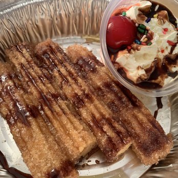 La Tolteca - Carryout: Churros (deep fried doughnut sticks rolled in cinnamon and sugar, topped with honey, chocolate syrup, whipped cream) - Mexican Near Me - Crofton, Maryland