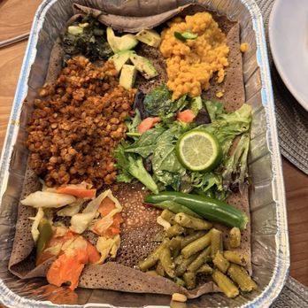 Mama Africa Cafe - "Two" veggie combos - Ethiopian Near Me - Denver, Colorado Mama Africa Cafe - "Two" veggie combos - Ethiopian Near Me - Denver, Colorado
