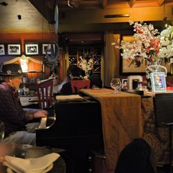 Carli's Fine Bistro & Piano - A shot of the dining room and Piano