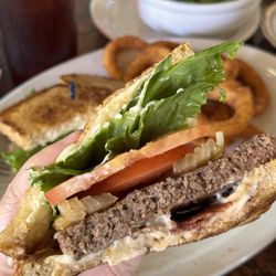 Flippy's Cafe - Grilled Sourdough Bacon Burger - on grilled sourdough w/ bacon, Swiss cheese, lettuce, tomato, and grilled onions! So amazing!!