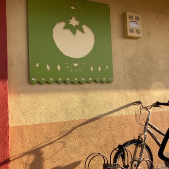 Del Taco - a bicycle leaning against a wall - Fast Food Near Me - Fullerton, California Del Taco - a bicycle leaning against a wall - Fast Food Near Me - Fullerton, California