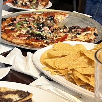 Sam's Place - Works pizza 12" , artichoke dip, - Sports Bars Near Me - Nashville, Tennessee Sam's Place - Works pizza 12" , artichoke dip, - Sports Bars Near Me - Nashville, Tennessee