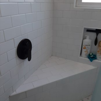 RemodelMe - Faucet single handle and diverter is on the pony wall for easy access, and seat. - Roofing Near Me - Los Angeles, California