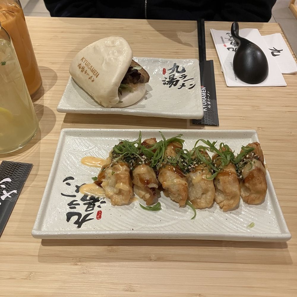 Kyuramen - Brookline - appetizers--gyoza and a pork bao bun - Ramen Near Me - Brookline, Massachusetts