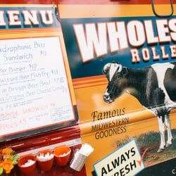 Their food truck and menu board. ©@julieimagery