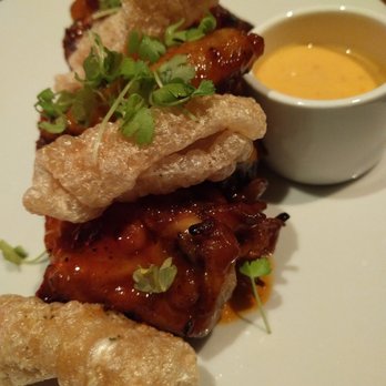 Arkadia Grill - The Wings - smoked and slow cooked, honey hot sauce. Very tender, amazing flavor. So good I preferred the bits that had no Sauce - Burgers Near Me - Miami Beach, Florida Arkadia Grill - The Wings - smoked and slow cooked, honey hot sauce. Very tender, amazing flavor. So good I preferred the bits that had no Sauce - Burgers Near Me - Miami Beach, Florida