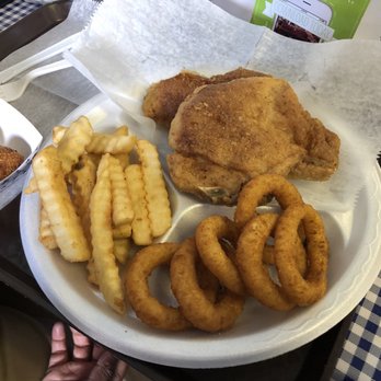 Uncle Larry's - Pork chop with onion rings and fries - Seafood Near Me - Chattanooga, Tennessee Uncle Larry's - Pork chop with onion rings and fries - Seafood Near Me - Chattanooga, Tennessee