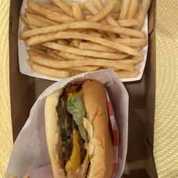 Double Cheeseburger Combo with fries and a drink. Double Cheeseburger Combo with fries and a drink.