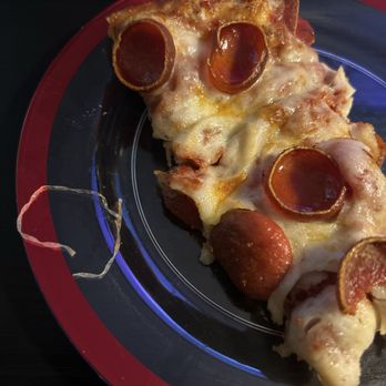 Mountain Mike's Pizza - A small clear rubber band was in my pizza- I broke it apart to check what it was. DISGUSTING! - Pizza Near Me - Redlands, California