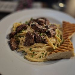 botL - Cacio E Pepe with steak filet.
