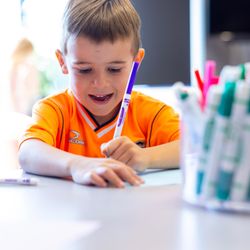 Preschool child doing an activity.