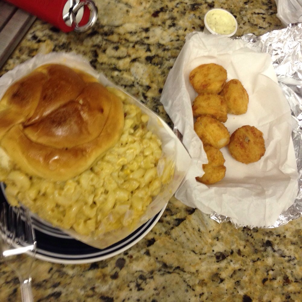 "Mac daddy" burger stuffed with cheese and bacon, topped with THE BEST Mac and cheese (I forget what the cheese balls are called "Mac daddy" burger stuffed with cheese and bacon, topped with THE BEST Mac and cheese (I forget what the cheese balls are called