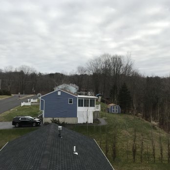 Smith Tree Works - a view of a residential neighborhood - Tree Services Near Me - Northfield, Connecticut