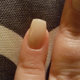 My uneven & misshapen nails and the gray dust speck. Not good at all. $35.00. :-(