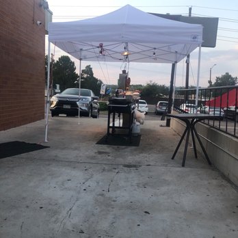 Taco Mex - a table and chairs under a canopy - Mexican Near Me - Denver, Colorado
