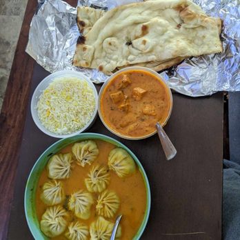 Himalayan Restaurant - Jhol momo, Paneer makhani with rice and butter naan. - Indian Near Me - Cleveland, Ohio